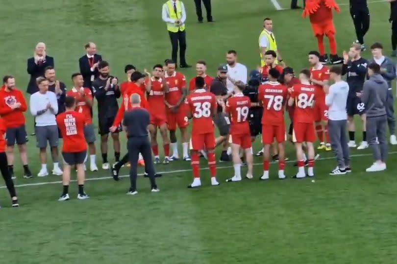 Jürgen Klopp is given a guard of honor from his Liverpool players