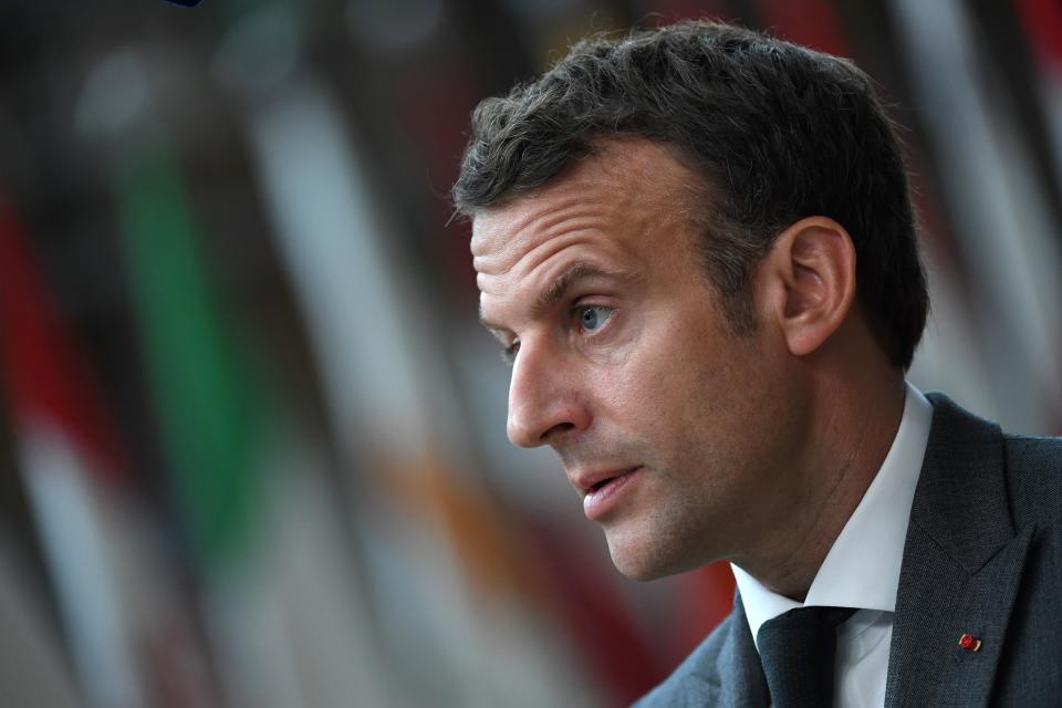 French President Emmanuel Macron talks to journalists as he arrives for an EU summit at the European Council building in Brussels, Thursday, June 24, 2021. At their summit in Brussels, EU leaders are set to take stock of coronavirus recovery plans, study ways to improve relations with Russia and Turkey, and insist on the need to develop migration partners with the countries of northern Africa, but a heated exchange over a new LGBT bill in Hungary is also likely. (John Thys, Pool Photo via AP)