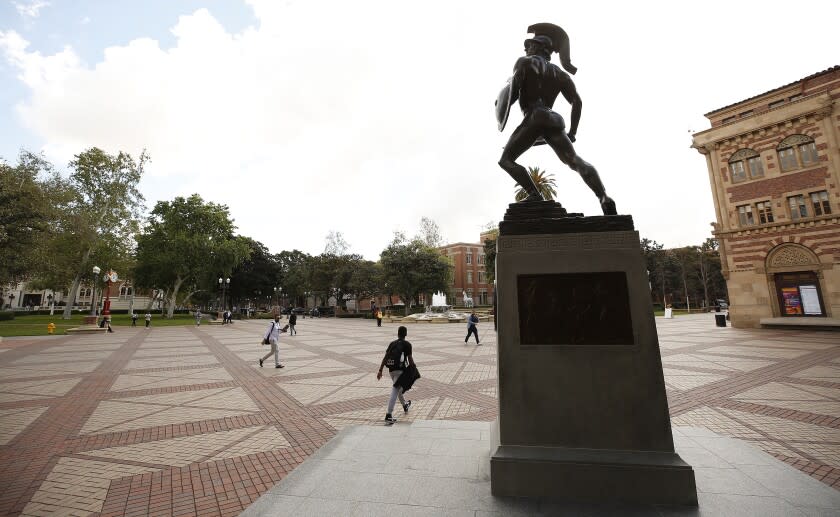 LOS ANGELES, CA - MARCH 10, 2020 Tommy Trojan stands guard over a quiet University of Southern California USC campus near downtown Los Angeles on Wednesday as classes are being held online for the first day. (Al Seib / Los Angeles Times)