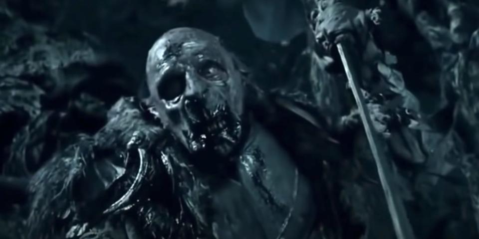 Grishnákh in a forrest in lord of the rings