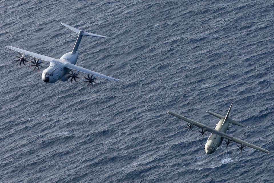 A U.K. Royal Air Force A400M Atlas (left) and a C-130J during Exercise Tartan Spirit. <em>Crown Copyright</em>