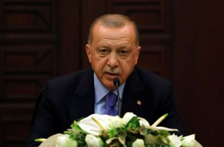 Turkish President Erdogan speaks during a joint news conference with his counterparts Rouhani of Iran and Putin of Russia in Ankara