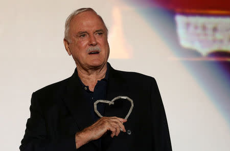 British actor John Cleese poses with the Heart of Sarajevo honorary award during the 23rd Sarajevo Film Festival in Sarajevo, Bosnia and Herzegovina, August 16, 2017. REUTERS/Dado Ruvic