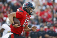 Texas Tech's Tyler Shough (12) runs with the ball during the first half of an NCAA college football game against Florida International, Saturday, Sept. 18, 2021, in Lubbock, Texas. (AP Photo/Brad Tollefson)