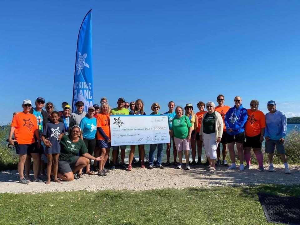 The Mackinac Island Swim supports the Mackinaw Woman’s Club. The finish line festivities at Mission Point Resort are a fundraiser for the club.