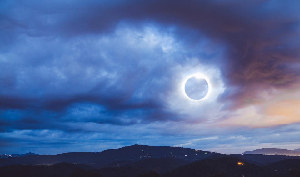 The Totality Solar Eclipse a double exposed image shot with the Blue Ridge Mountains in North Carolina.