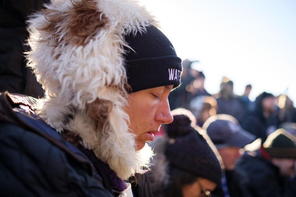 Tamara Bliss Sharp of Oakland, Calif. prays at the Oceti Sakowin campground.