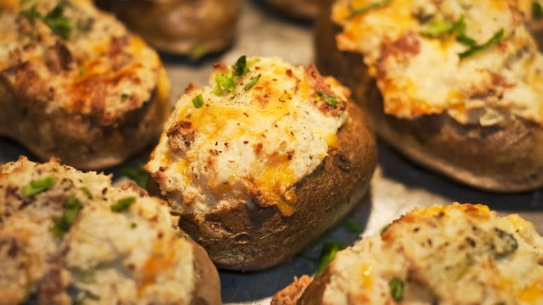 Baked potatoes topped with chives