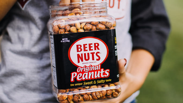 holding Beer Nuts container