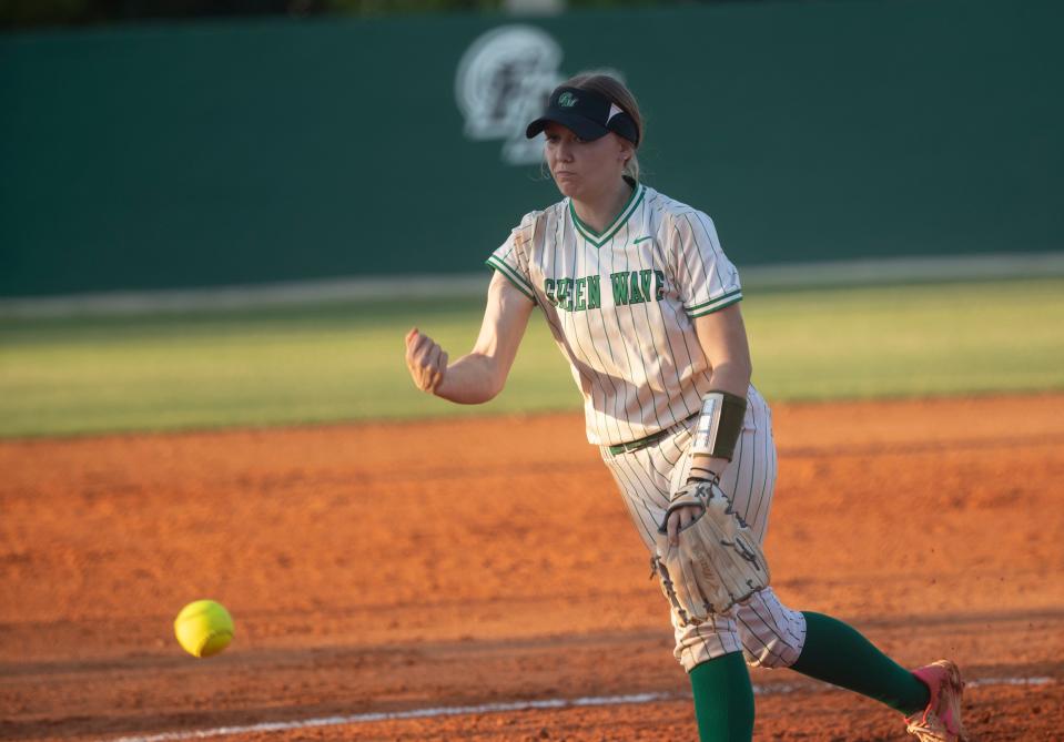 Alexa Bent of the Fort Myers High School softball pitches in a win over East Bay High School during a regional softball game at Fort Myers on Thursday, May 9, 2024.