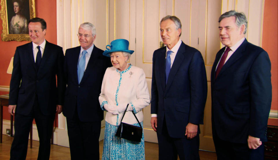 Undated handout screen grab issued by Oxford Film and Television of the Queen meeting Prime Minister David Cameron plus former Prime Ministers John Major, Tony Blair and Gordon Brown at 10 Downing Street, from the Our Queen documentary, a landmark, in-depth portrait of Queen Elizabeth II during one of the most momentous years of her reign.