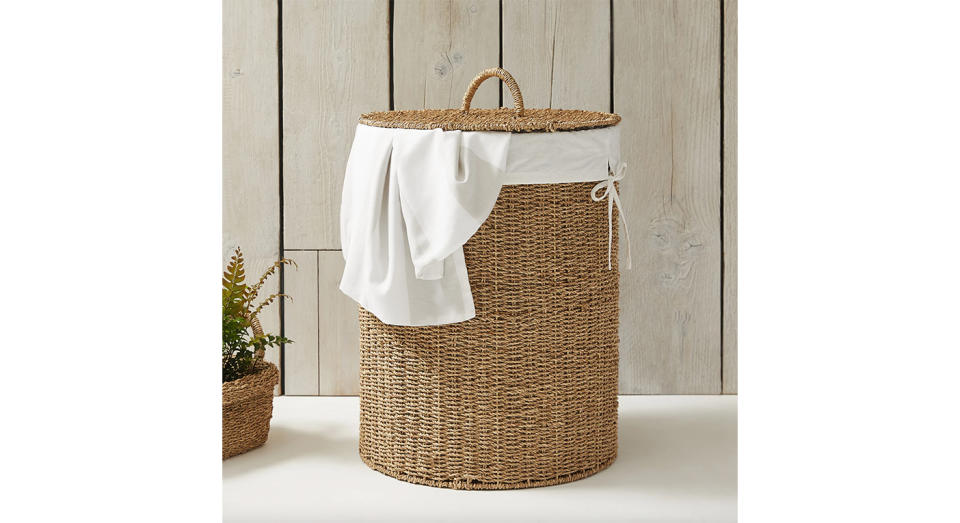 This lidded basket is a stunning and practical addition to any utility room.