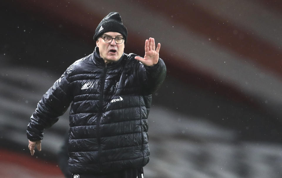 Leeds United's head coach Marcelo Bielsa reacts during the English Premier League soccer match between Arsenal and Leeds United at the Emirates stadium in London, England, Sunday, Feb. 14, 2021. (Adam Davy/Pool via AP)