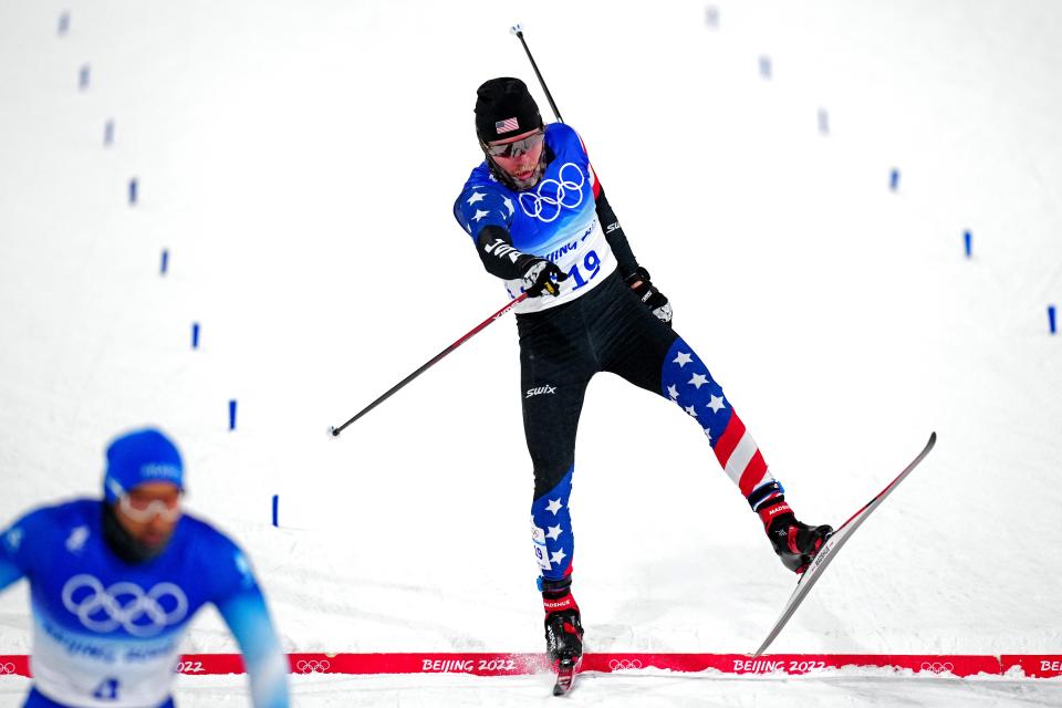 Ben Ogden (USA) crosses the finish in the men's cross-country skiing freestyle sprint during the Beijing 2022 Olympic Winter Games at Zhangjiakou Cross-Country Centre.