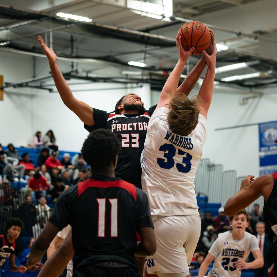 Proctor's Ronny Perez (23) and Whitesboro's Colin Steere collide during a Dec. 15 game. Perez and the Raiders play the opening game of the Nexus Center's three-day Downtown Classic Thursday.