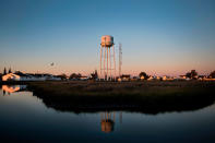 <p>The sun sets in Tangier, Virginia, May 15, 2017, where climate change and rising sea levels threaten the inhabitants of the slowly sinking island.<br> (Jim Watson/AFP/Getty Images) </p>