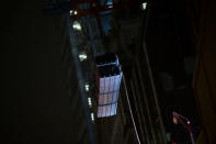 Construction continues into the night in the City of London, Britain October 18, 2017. Picture taken October 18, 2017. REUTERS/Mary Turner