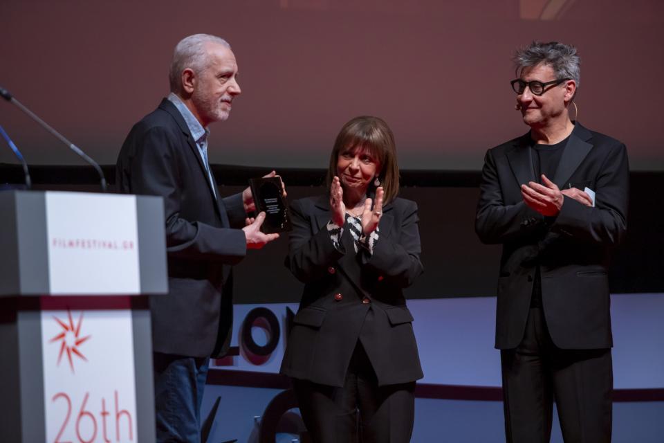 Greek President Katerina Sakellaropoulou (center) with filmmaker Fernando Trueba (right) and Orestis Andreadakis, festival artistic director.