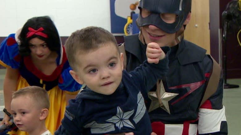 Toddler with devastating diagnosis surprised with superhero party