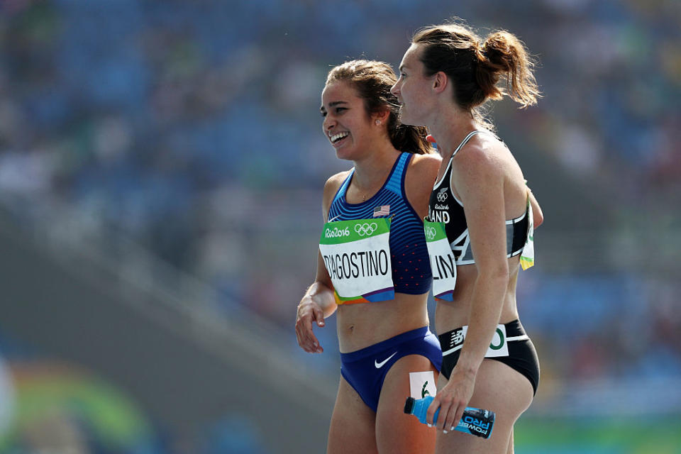 RIO DE JANEIRO, BRAZIL - AUGUST 16: Abbey D'Agostino of the United States (L) talks with Nikki Hamblin of New Zealand after the Women's 5000m Round 1 - Heat 2 on Day 11 of the Rio 2016 Olympic Games at the Olympic Stadium on August 16, 2016 in Rio de Janeiro, Brazil. (Photo by Patrick Smith/Getty Images)