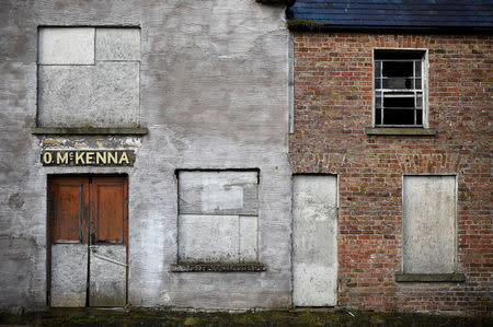 An abandoned shop is seen in Mullan, Ireland, March 16, 2018. The building was home to four families who left during The Troubles. The town was largely abandoned after the hard border was put in place during the conflict. Mullan has seen some regeneration in recent years, but faces an uncertain future with Brexit on the horizon. REUTERS/Clodagh Kilcoyne