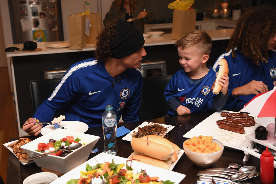 Hudson and the players enjoy an Aussie BBQ.