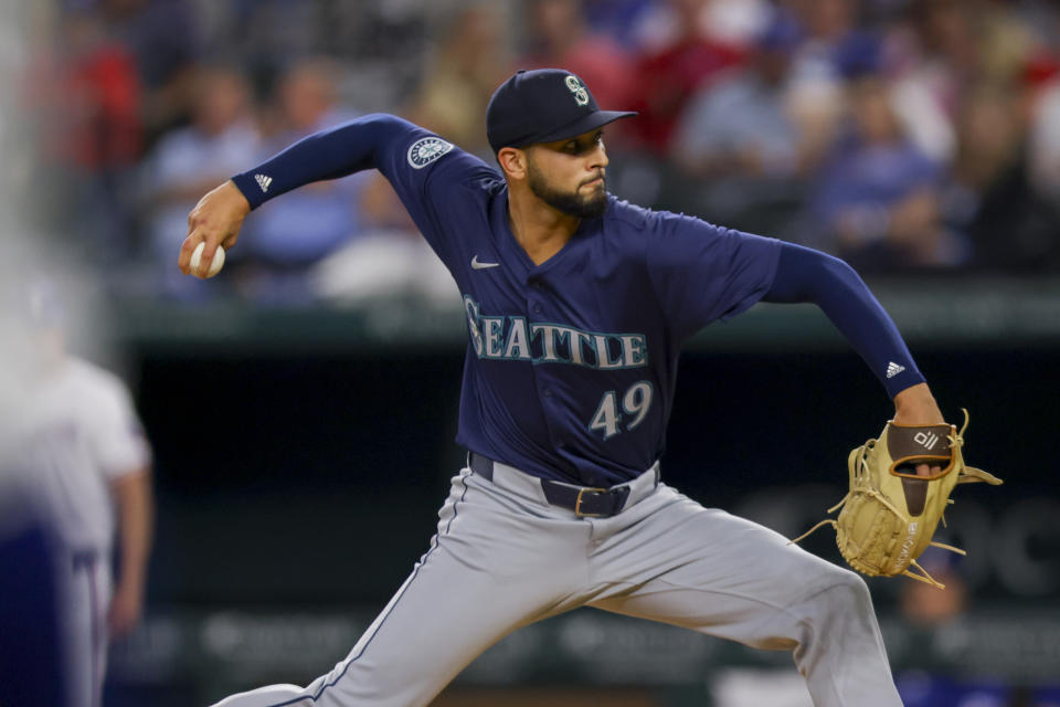 Seattle Mariners relief pitcher Tyson Miller delivers a pitch in the sixth inning of a baseball game against the Texas Rangers, Wednesday, April 24, 2024, in Arlington, Texas. (AP Photo/Gareth Patterson)