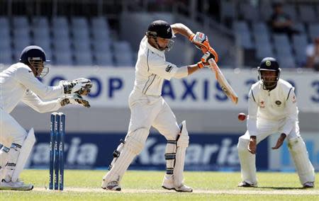 New Zealand's BJ Watling plays a shot on day three of the first international test cricket match against India at Eden Park in Auckland, February 8, 2014. REUTERS/Nigel Marple