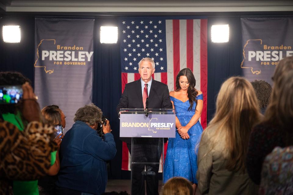 Democratic gubernatorial candidate Brandon Presley, with wife Katelyn Presley by his side, concedes to incumbent Republican Tate Reeves at The Faulkner in Jackson, Miss., Tuesday, Nov. 7, 2023.