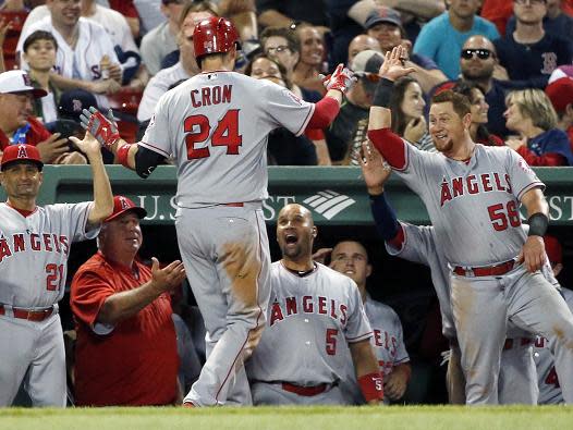 C.J. Cron of the Angels celebrates his two-run home run during the seventh inning. (AP)