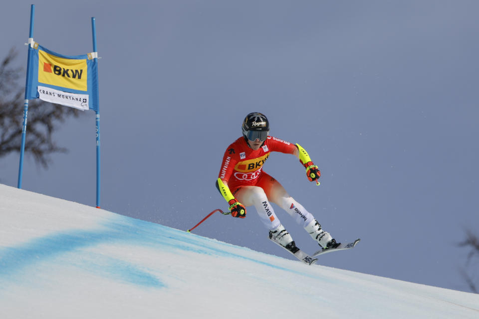 Switzerland's Lara Gut Behrami speeds down the course during an alpine ski, women's World Cup super-G, in Crans Montana, Switzerland, Sunday, Feb. 18, 2024. (AP Photo/Giovanni Maria Pizzato)