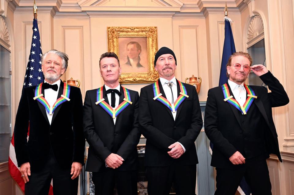 2022 Kennedy Center Honorees from the rock band U2 Adam Clayton, Larry Mullen Jr., The Edge, and Bono pose for a group photo at the State Department following the Kennedy Center Honors gala dinner, Saturday, Dec. 3, 2022, in Washington.