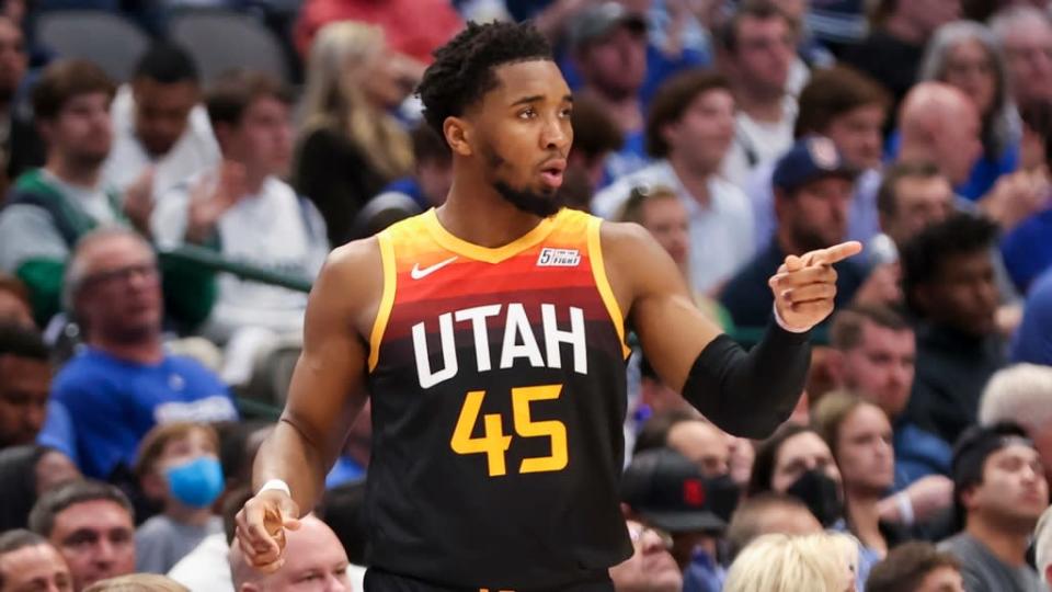 Donovan Mitchell closeup in multicolored Jazz jersey during 2022 playoffs