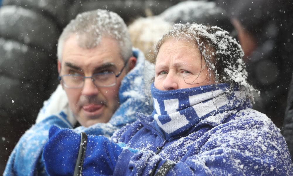 Everton fans brave the snow during a Premier League away game against Stoke City on Saturday.