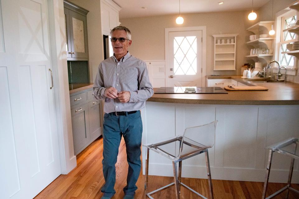 Realtor Mike Sibbald of Elevations Real Estate provides a tour on April 27 of a home he recently sold in the University Acres neighborhood in Fort Collins. The three-bedroom, three-bath, 1960s ranch-style home with a basement sold for $990,000, more than $100,000 over listing price.