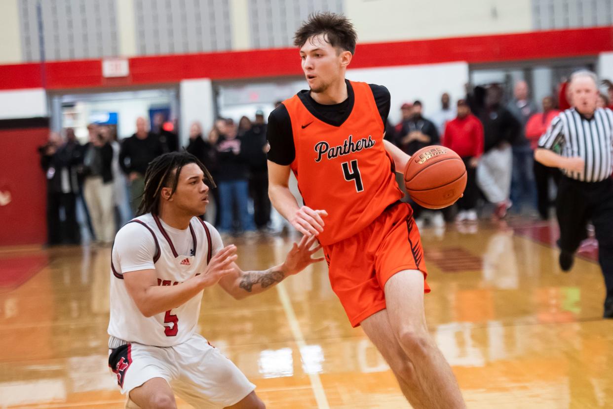 Central York's Greg Guidinger begins to drive to the hoop during a PIAA Class 6A basketball semifinal against Reading at Warwick High School on March 19, 2024, in Lititz. Guidinger led Central York to a state title this season.