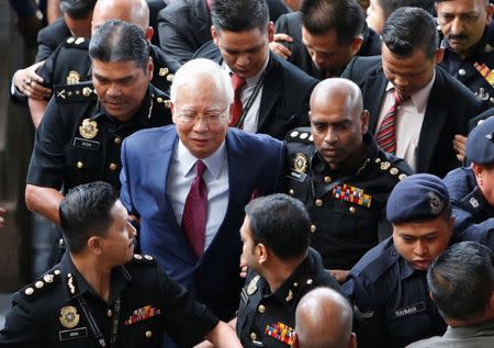 Former Malaysian prime minister Najib Razak arrives in court in Kuala Lumpur, Malaysia July 4, 2018. REUTERS/Lai Seng Sin