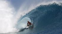 <p>The Aussie tames a Tahitian barrel in style in 2012.</p>