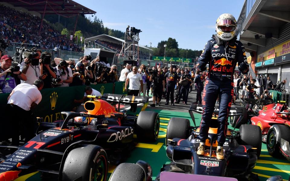 Red Bull driver Max Verstappen of the Netherlands stands on his car in the Parc Ferme after winning the Formula One Grand Prix at the Spa-Francorchamps racetrack in Spa, Belgium, Sunday, Aug. 28, 2022 - Geert Vanden Wijngaert, Pool)