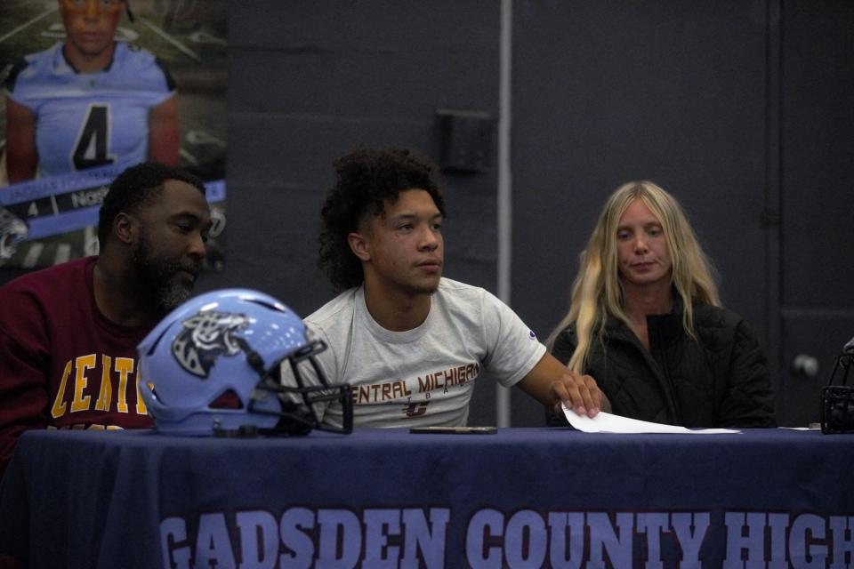 Gadsden County senior Nassir Williams signs his national letter of intent to Central Michigan on Dec. 20, 2023