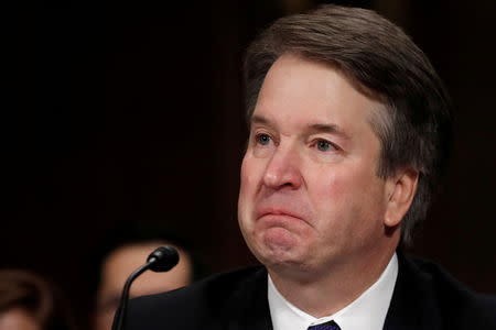 FILE PHOTO: U.S. Supreme Court nominee Brett Kavanaugh becomes emotional as he testifies before a Senate Judiciary Committee confirmation hearing for Kavanaugh on Capitol Hill in Washington, U.S., September 27, 2018. REUTERS/Jim Bourg/File Photo