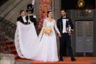 <p>Princess Sofia's gown was created by Swedish designer <a href="https://www.theknot.com/content/princess-sofia-hellqvist-prince-carl-philip-wedding-dress" rel="nofollow noopener" target="_blank" data-ylk="slk:Ida Sjöstedt;elm:context_link;itc:0;sec:content-canvas" class="link ">Ida Sjöstedt</a> and featured long lace sleeves and a matching veil.</p>