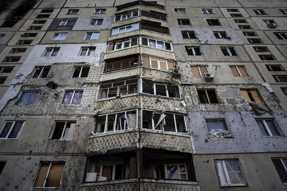 An appartment building damaged by a Russian attack in Saltivka district in Kharkiv, Ukraine, Tuesday, July 5, 2022. (AP Photo/Evgeniy Maloletka)