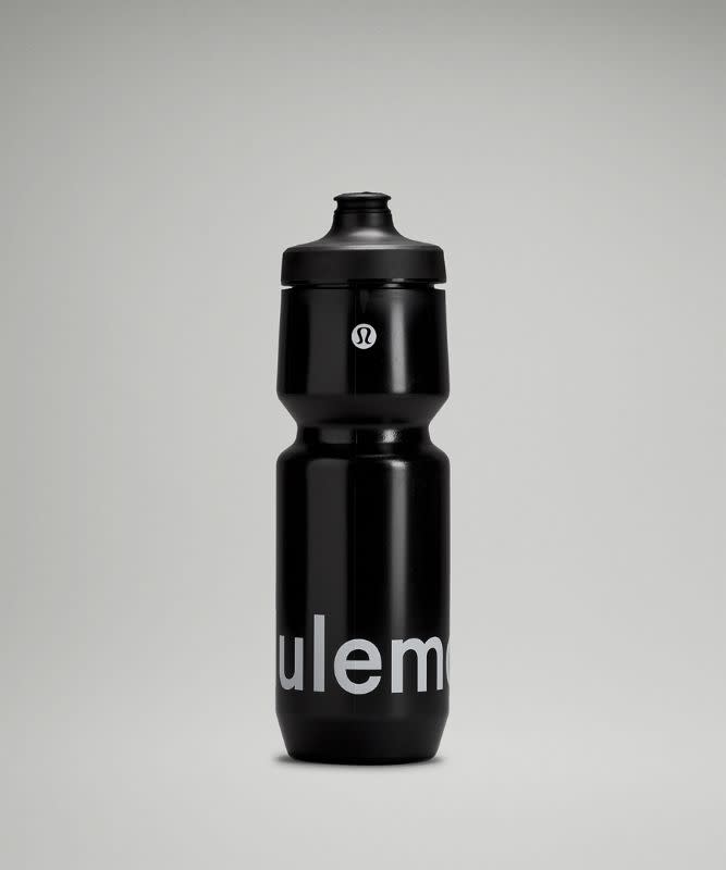 A black Lululemon Purist Cycling Water Bottle, $19 with logo wrapped around the base