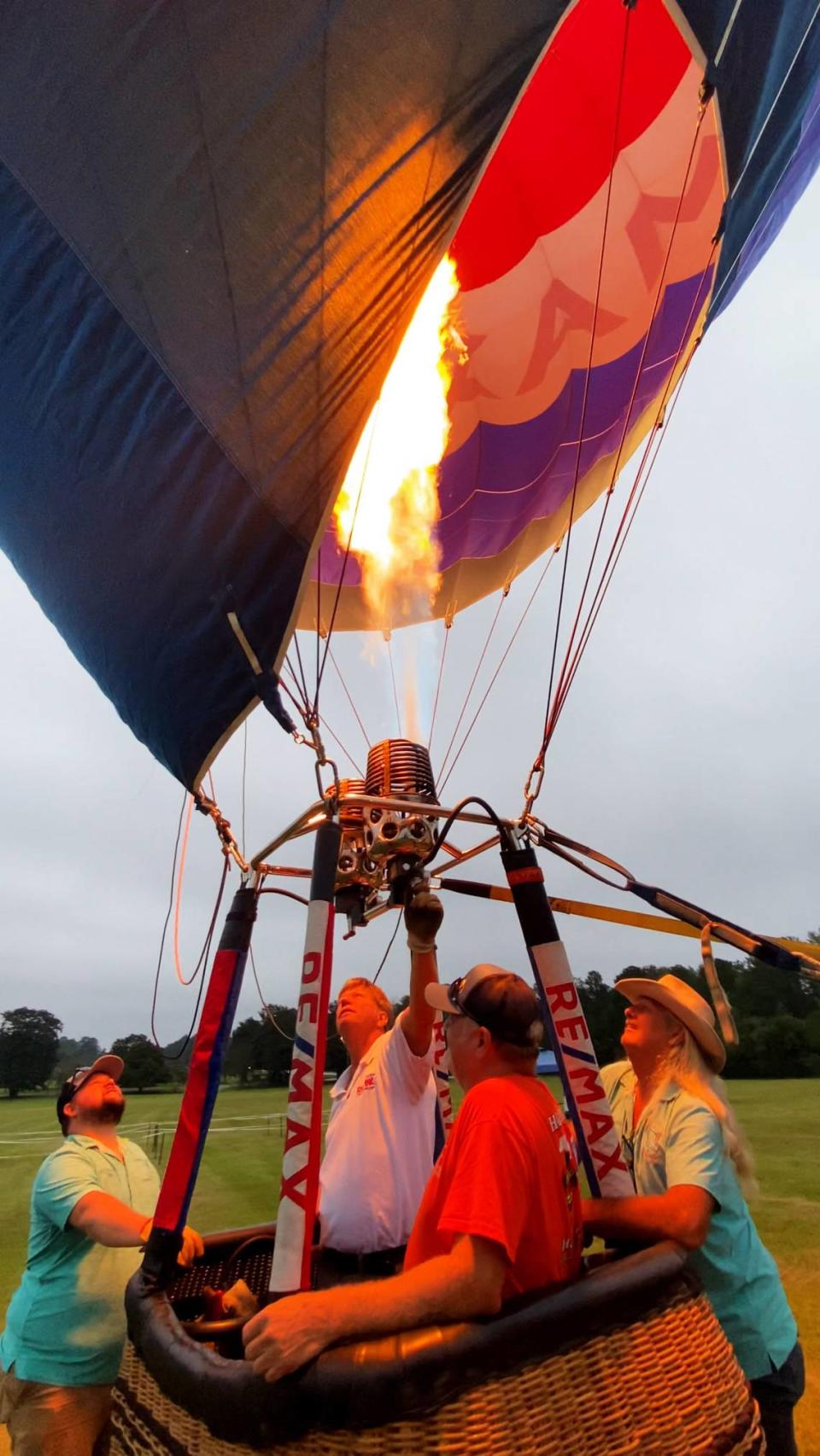 Hot air balloon pilot Stuart Enloe inflates his balloon Friday morning at Callaway Gardens during a preview event for Callaway’s Labor Day Balloon Festival. 09/01/2023