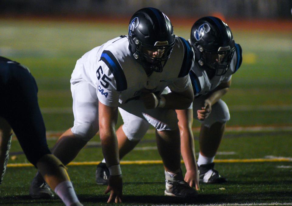 Central Bucks South's Collin Goetter (65) awaits the snap against Council Rock North.