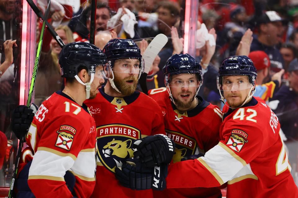 May 28, 2024; Sunrise, Florida, USA; Florida Panthers center Sam Bennett (9) celebrates with center Evan Rodrigues (17), right wing Vladimir Tarasenko (10) and defenseman Gustav Forsling (42) after scoring against the New York Rangers during the second period in game four of the Eastern Conference Final of the 2024 Stanley Cup Playoffs at Amerant Bank Arena. Mandatory Credit: Sam Navarro-USA TODAY Sports