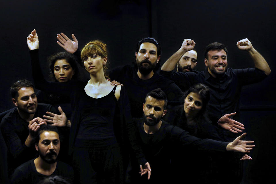 In this Friday, Feb. 8, 2019 photo, a team of Syrian actors take part in a playback theater at the end of a three-month training session, in Beirut, Lebanon. The aim of the training, that was held for the first time in a Beirut theater, is to raise awareness of conflict, help in reconciliation and initiate dialogue between rival groups. (AP Photo/Bilal Hussein)