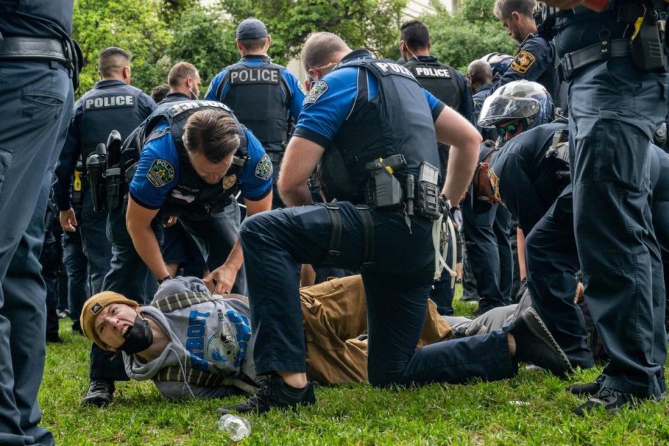 A student is arrested during a pro-Palestine demonstration at the The University of Texas at Austin on April 24, 2024 in Austin, Texas (Brandon Bell/Getty Images))