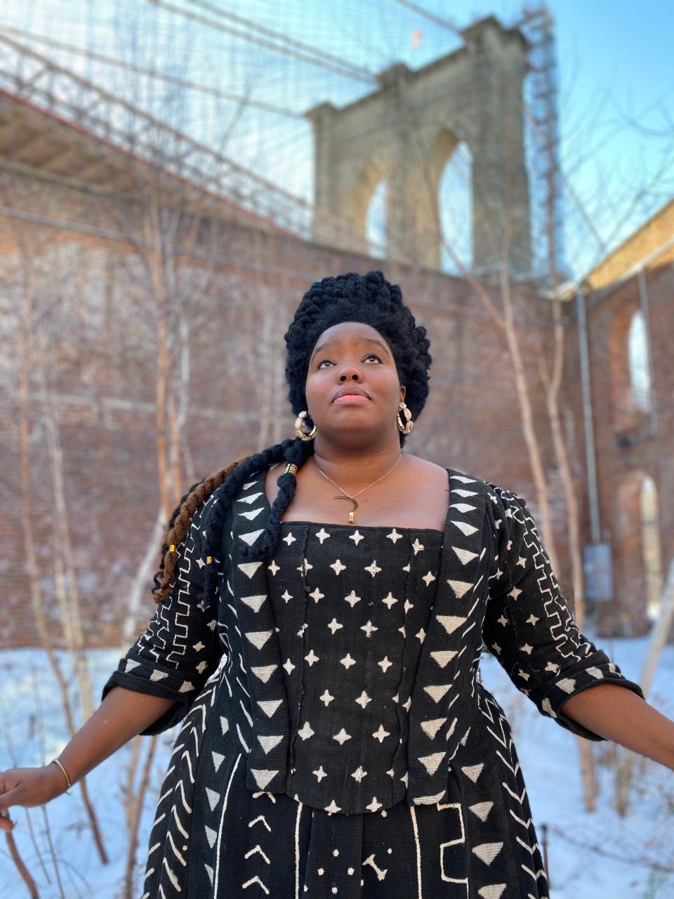 Cheyney McKnight, manager of the New-York Historical Society's living history program, organized a Pinkster stroll in Manhattan on May 25, 2024, in New York City. She wore her custom-made 18th-century mantua, a loose, draped gown with images of flowers, leaves, sickles and snakes.